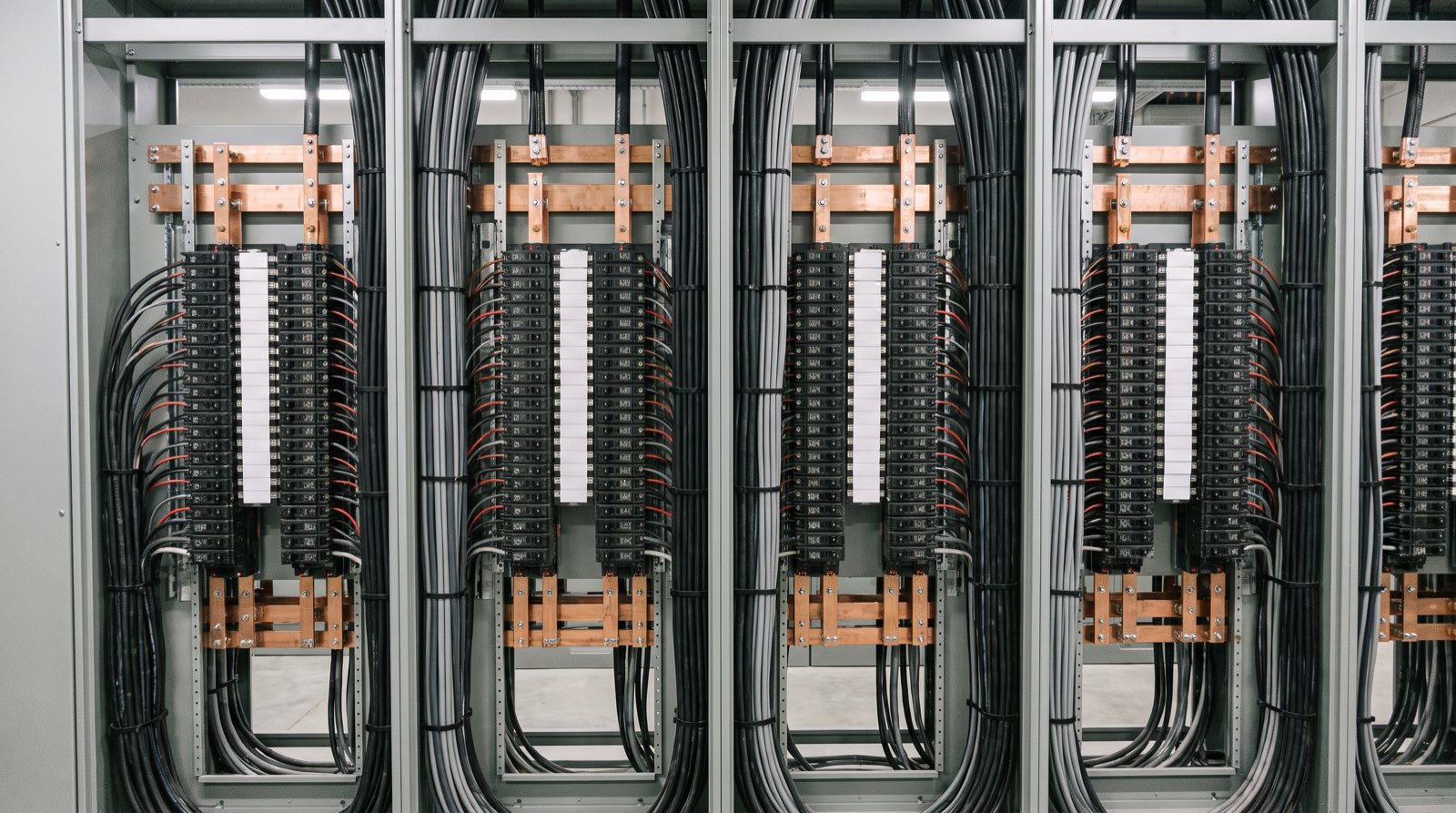 The replacement board, cabling combed into parallel runs